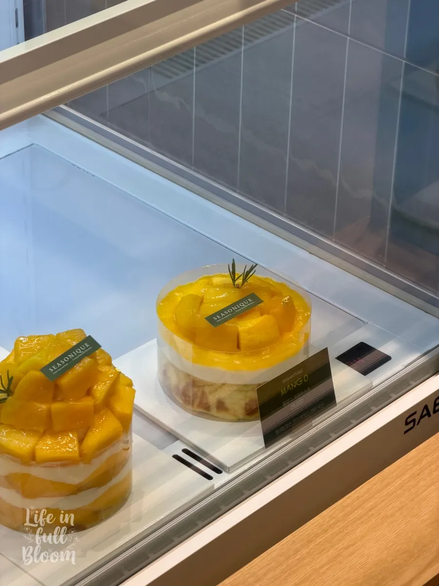 Whole-mango cream basque cheesecake in the showcase
