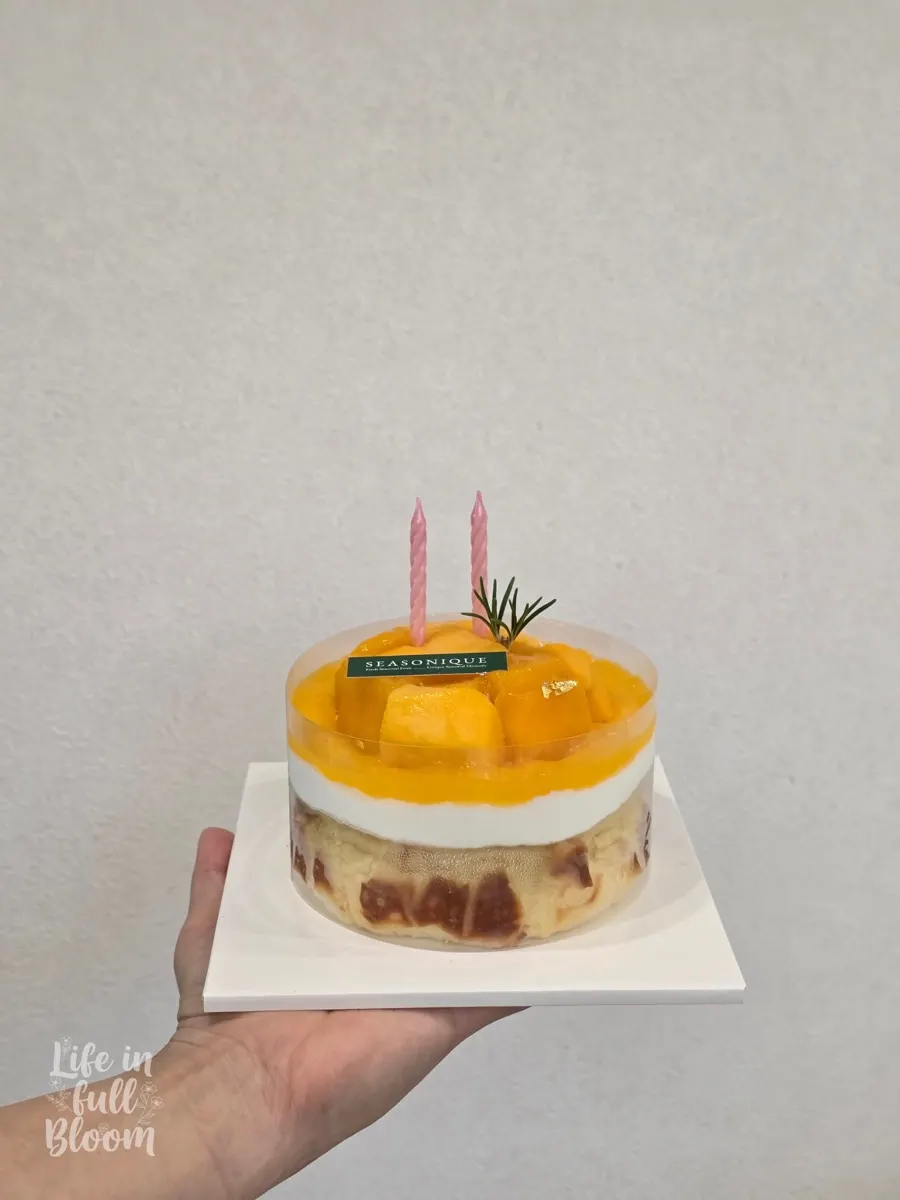 Cake with a number 2 candle