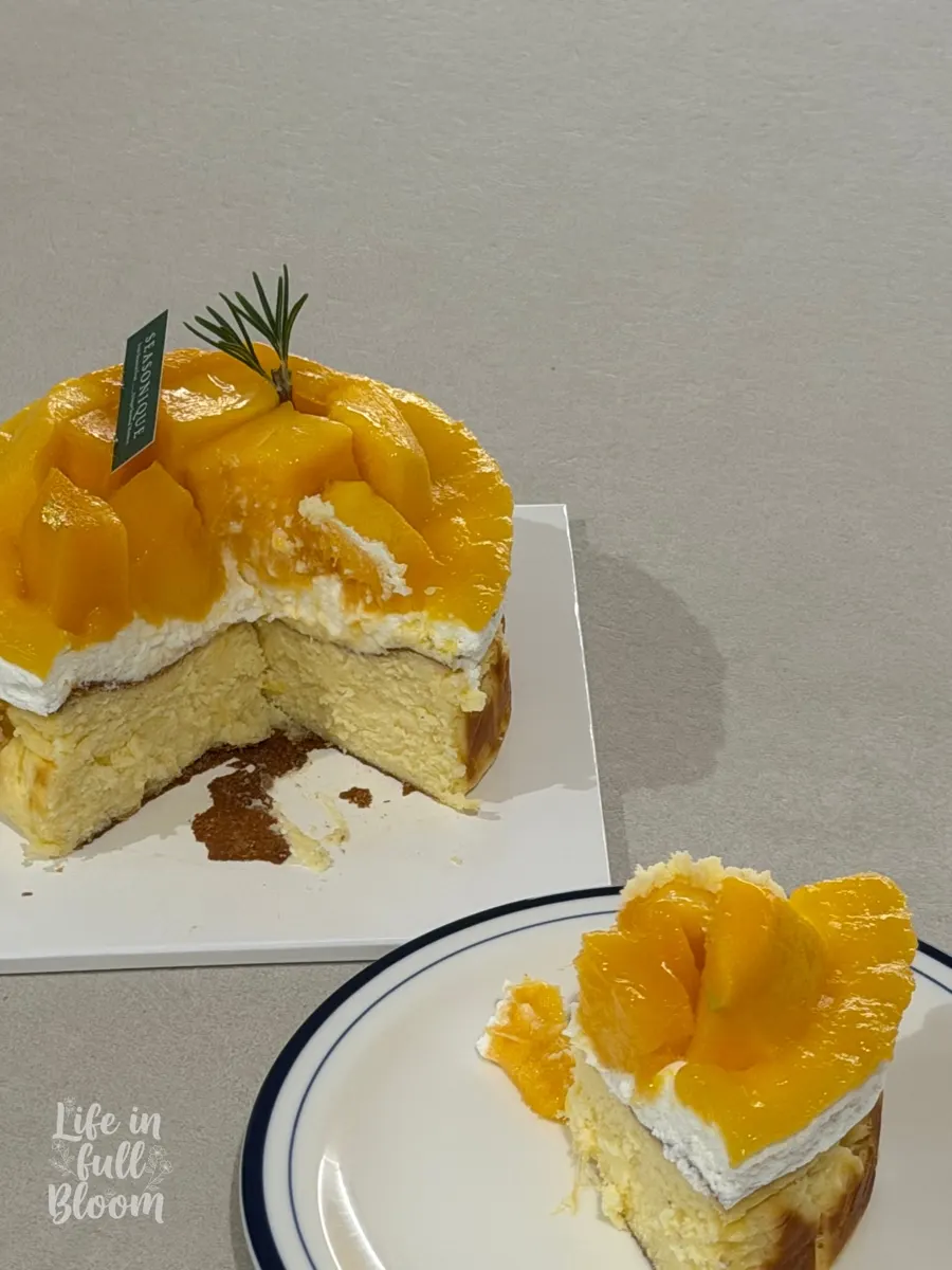 Cross-section of the whole-mango cream basque cut with a fork