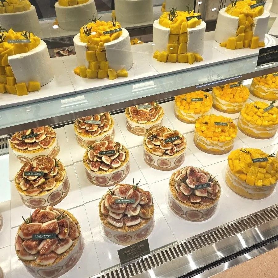Seasonal fruit cakes displayed in Siznique's showcase