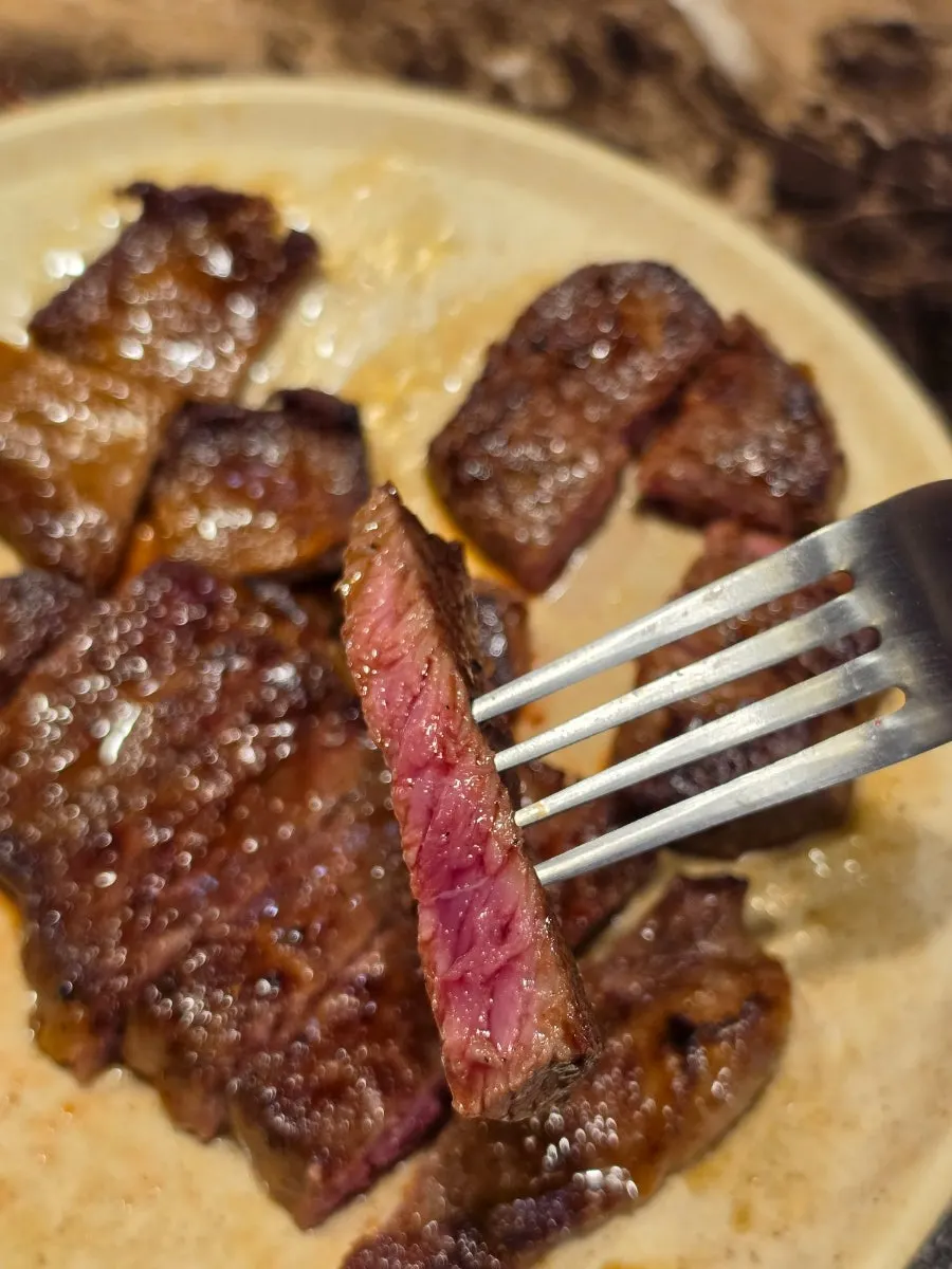 Flat iron steak topped with whole grain mustard sauce