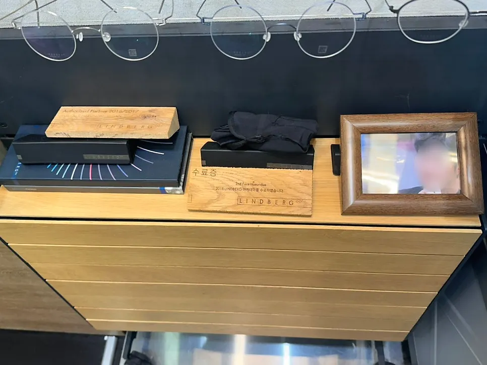 Lindberg Academy completion certificate displayed in store