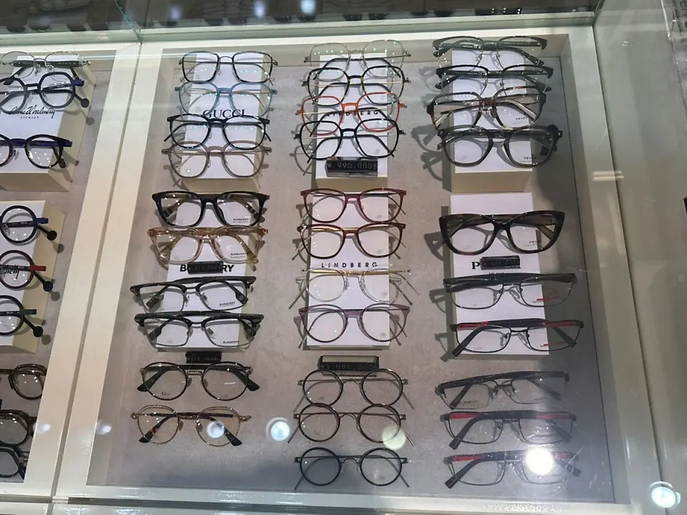 Chrome Hearts eyewear frame with cross logo detail