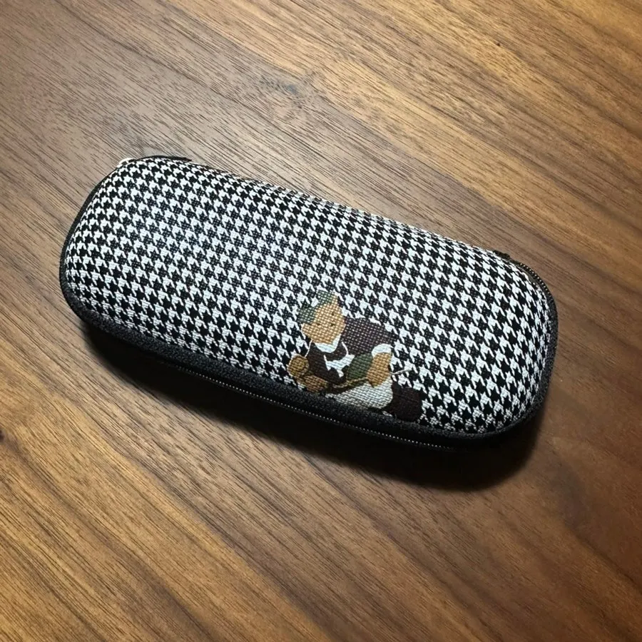 Purchased glasses next to the bear-shaped case