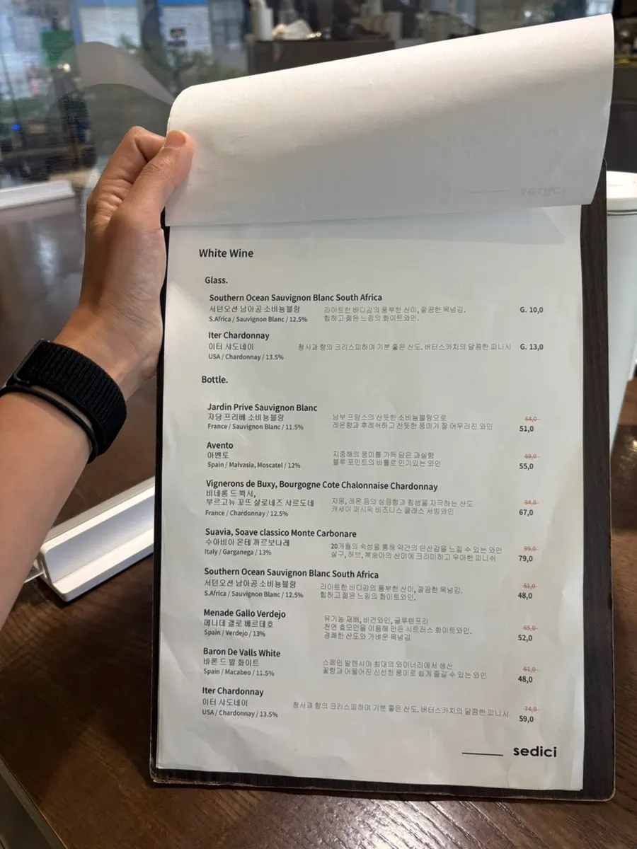 Sedici menu listing coffee and drink prices