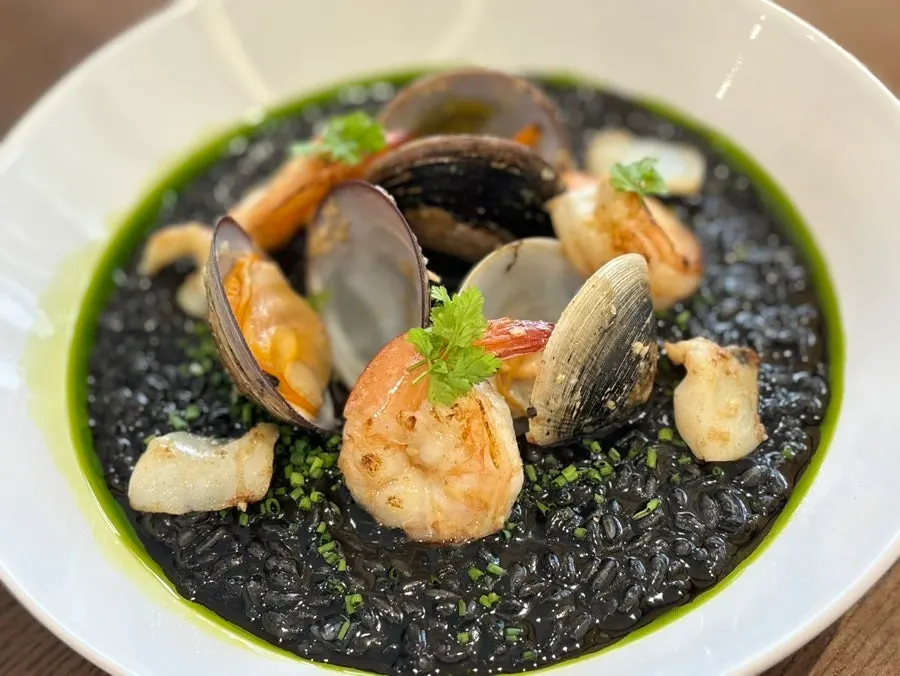 A plate of Sedici's black squid ink risotto