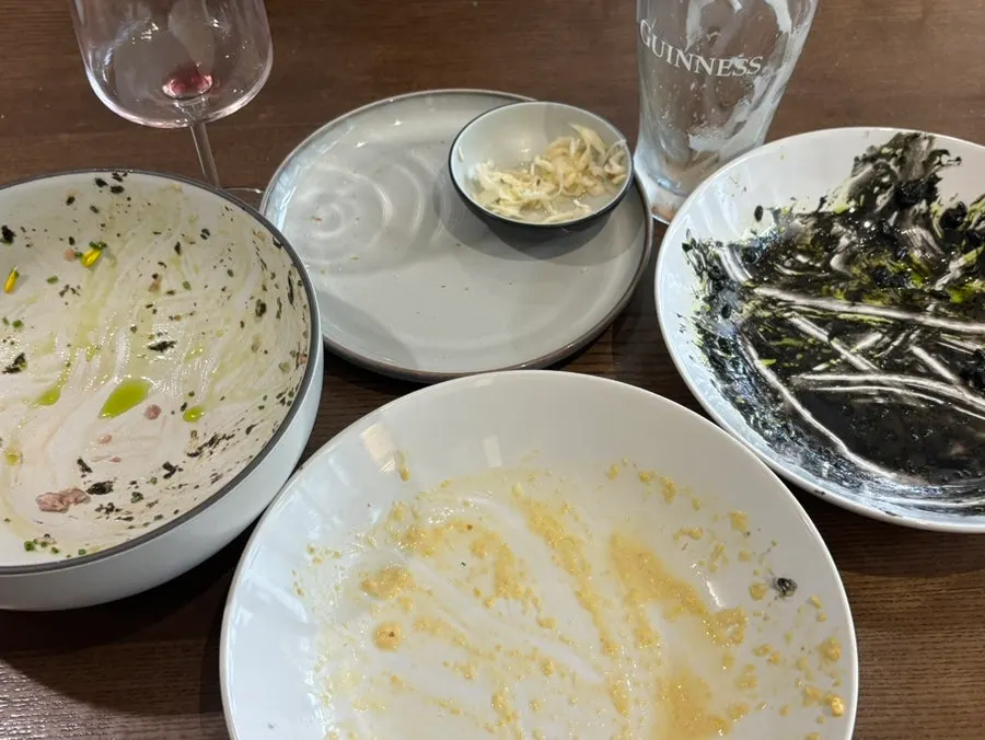Table with tartare, gnocchi, and risotto together