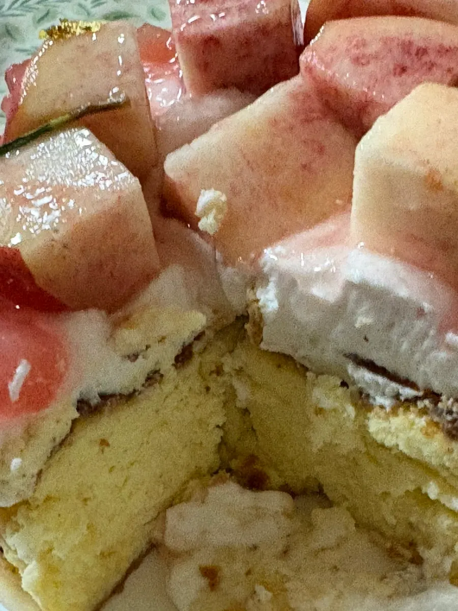 Cross-section of the cake showing sponge and cream