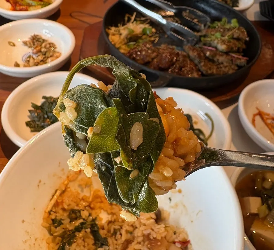 A Korean set meal with side dishes, rice and stew