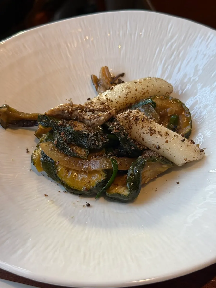 Plate of pancakes and grilled vegetables from the Bapkkot Special