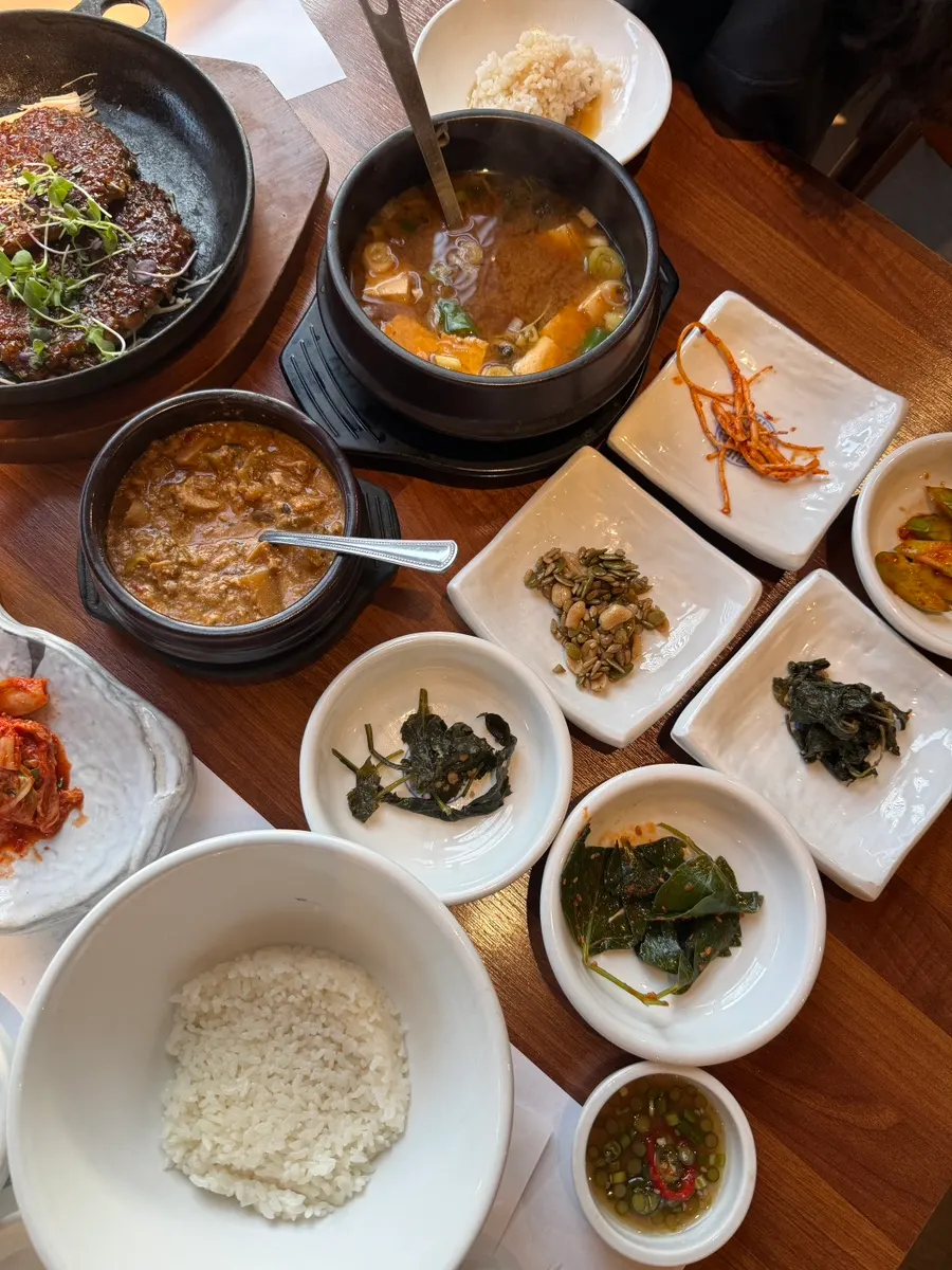 Earthenware pot of doenjang paste with plenty of ingredients