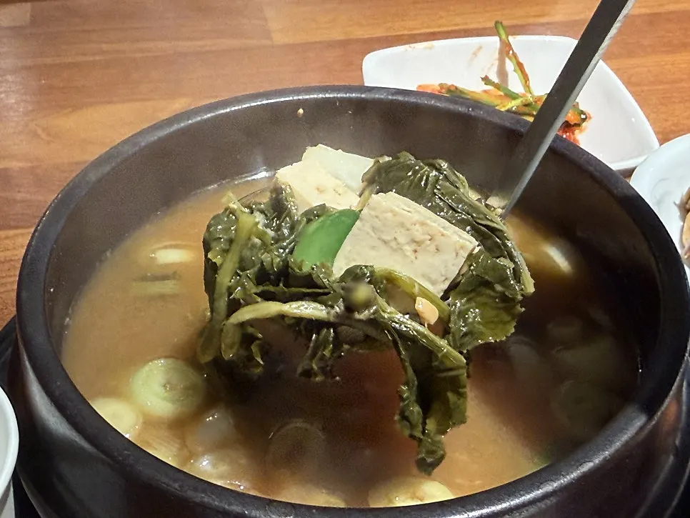 A bowl of thick soybean paste for mixing with rice