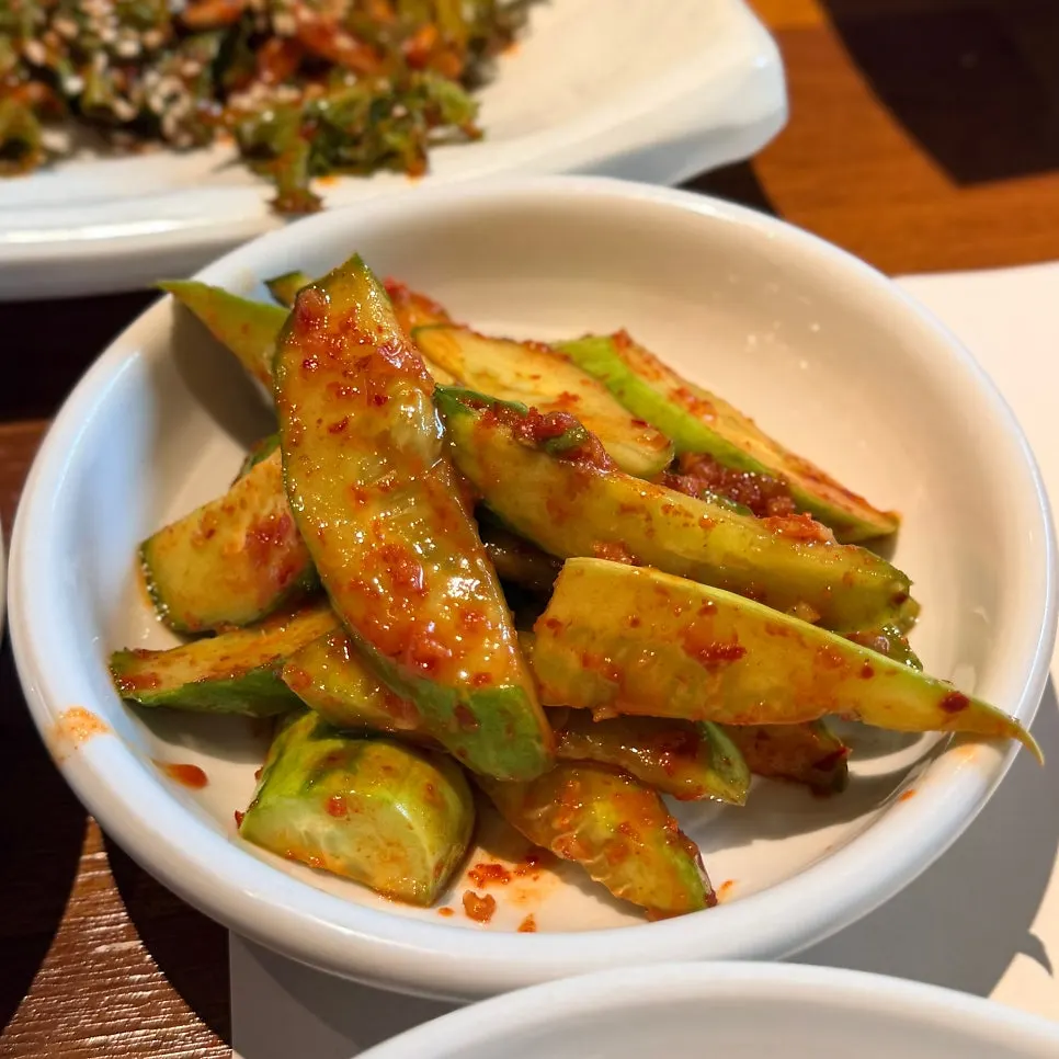 Samchae greens, cucumber salad and other banchan