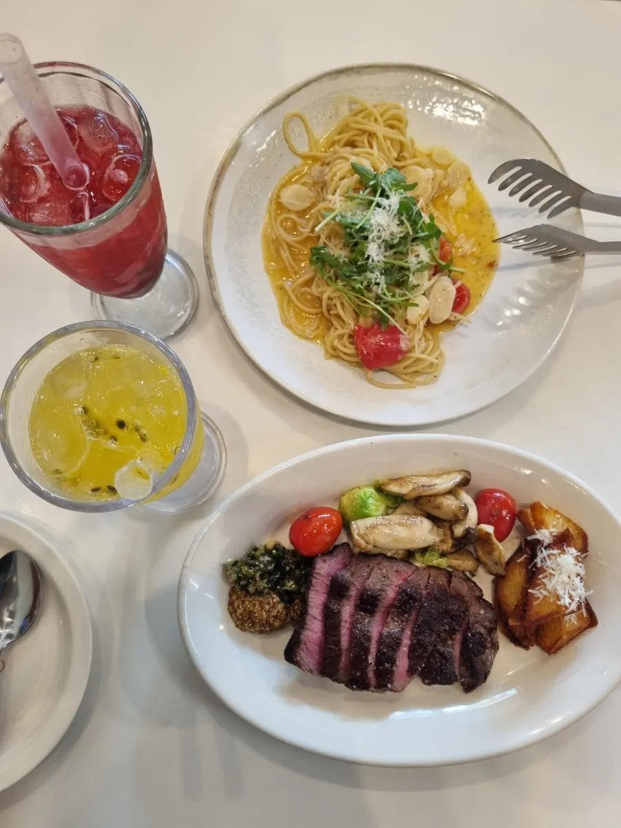 Steak and pasta served together