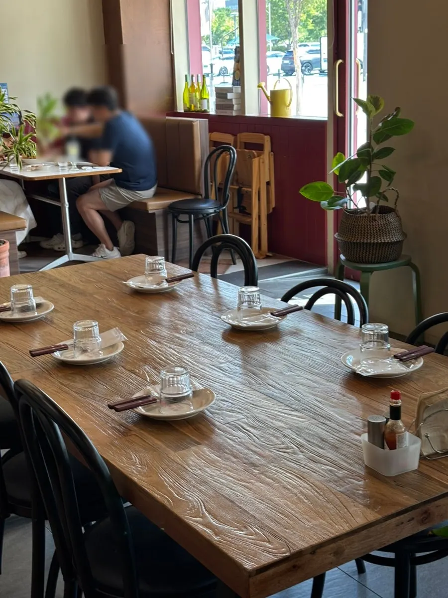 Restaurant interior with family diners