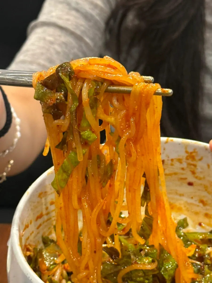 Jjolmyeon served with the meat