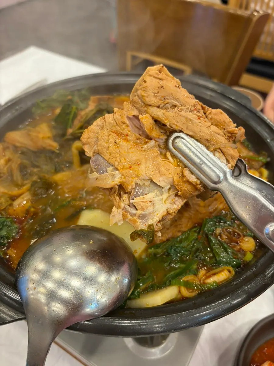 Pork spine bone with thick meat attached