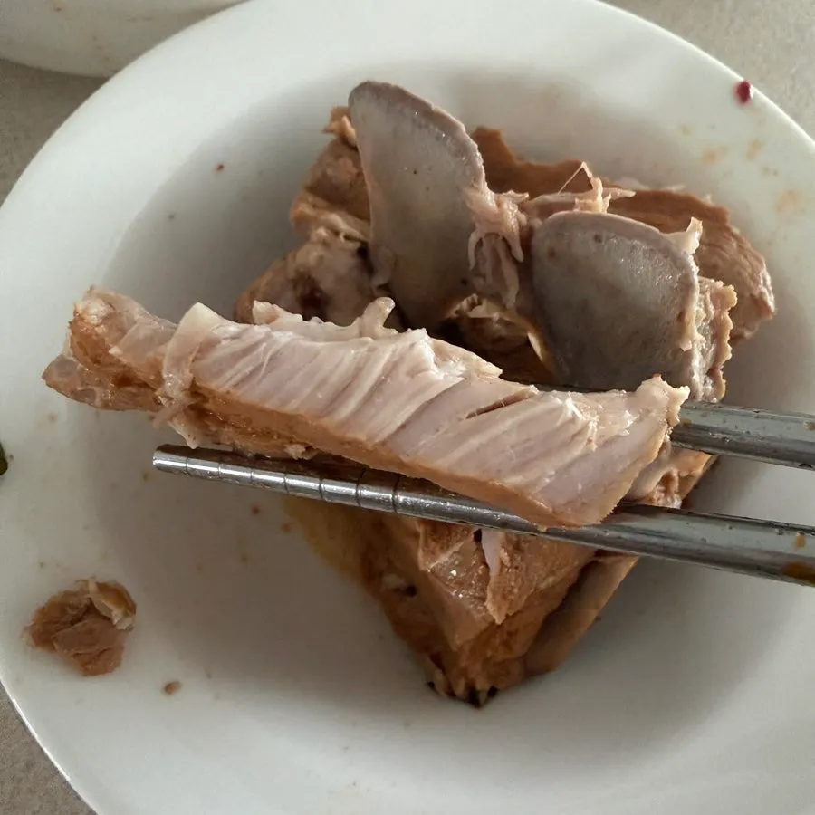A bowl of pork bone soup with napa cabbage and meat together