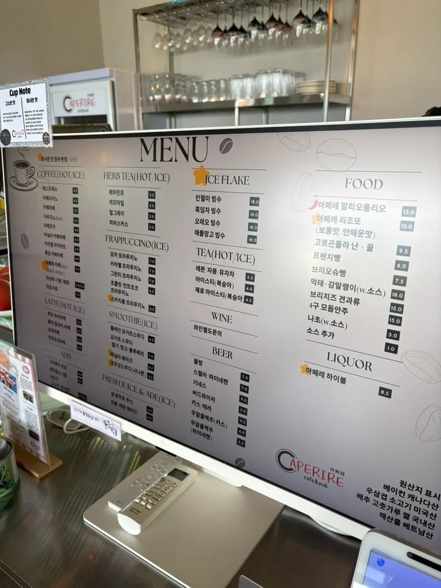 Apere's menu board listing coffee and brunch