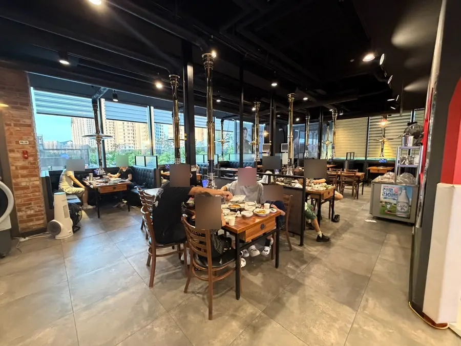 Korean BBQ restaurant interior with spacious tables