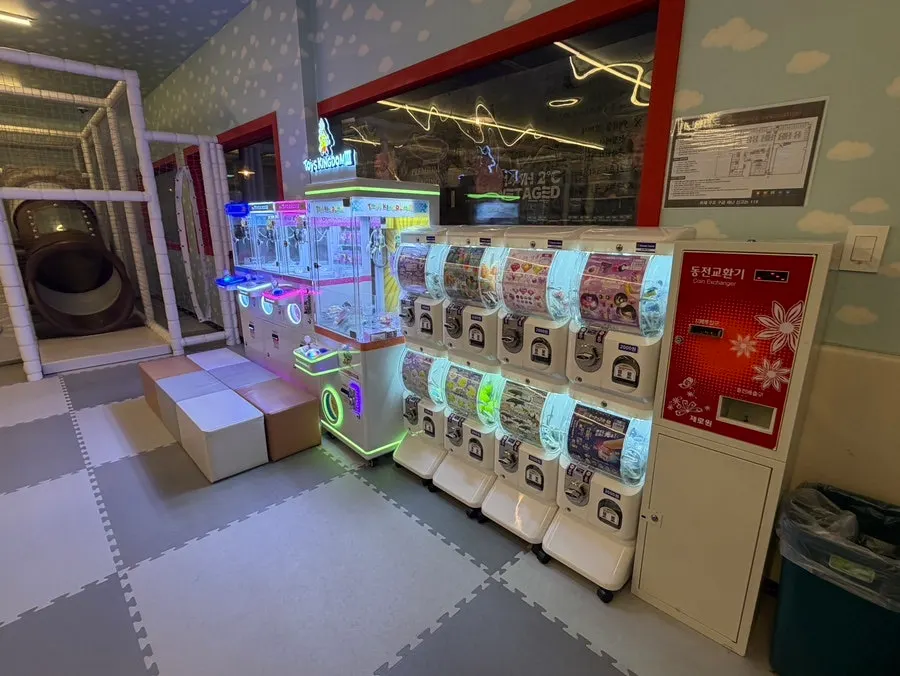 Playroom with arcade and claw machines
