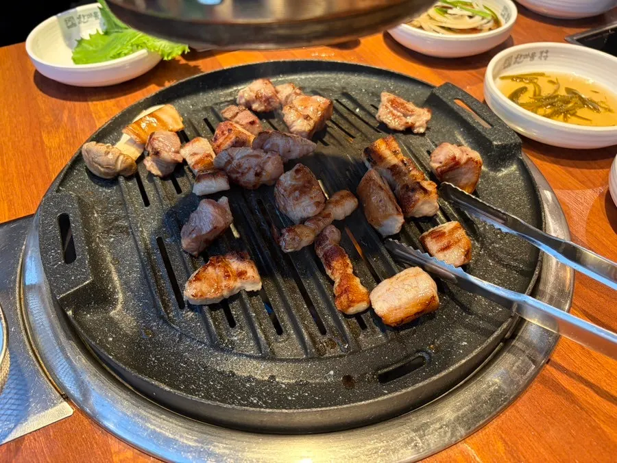 Several cuts of thick grilled pork