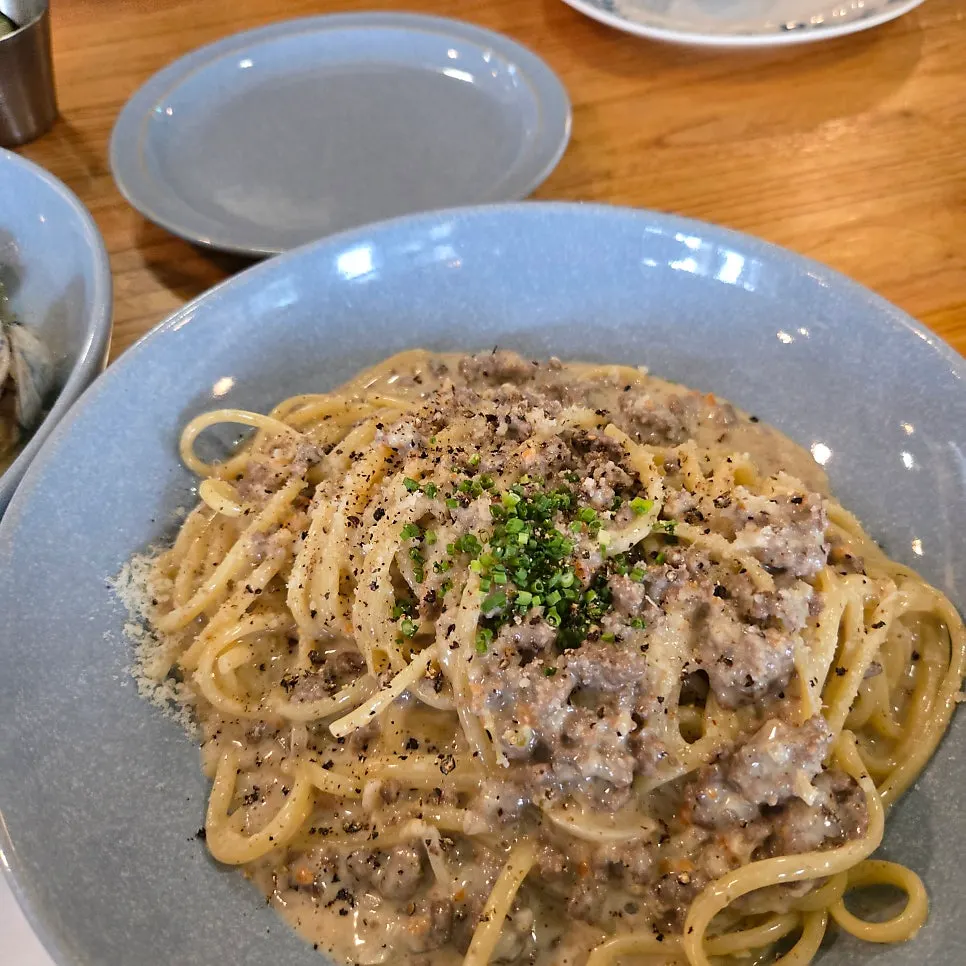 Truffle pasta noodles coated in cream sauce