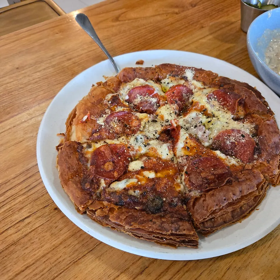 Le Garden Bleu's pastry-crust pizza