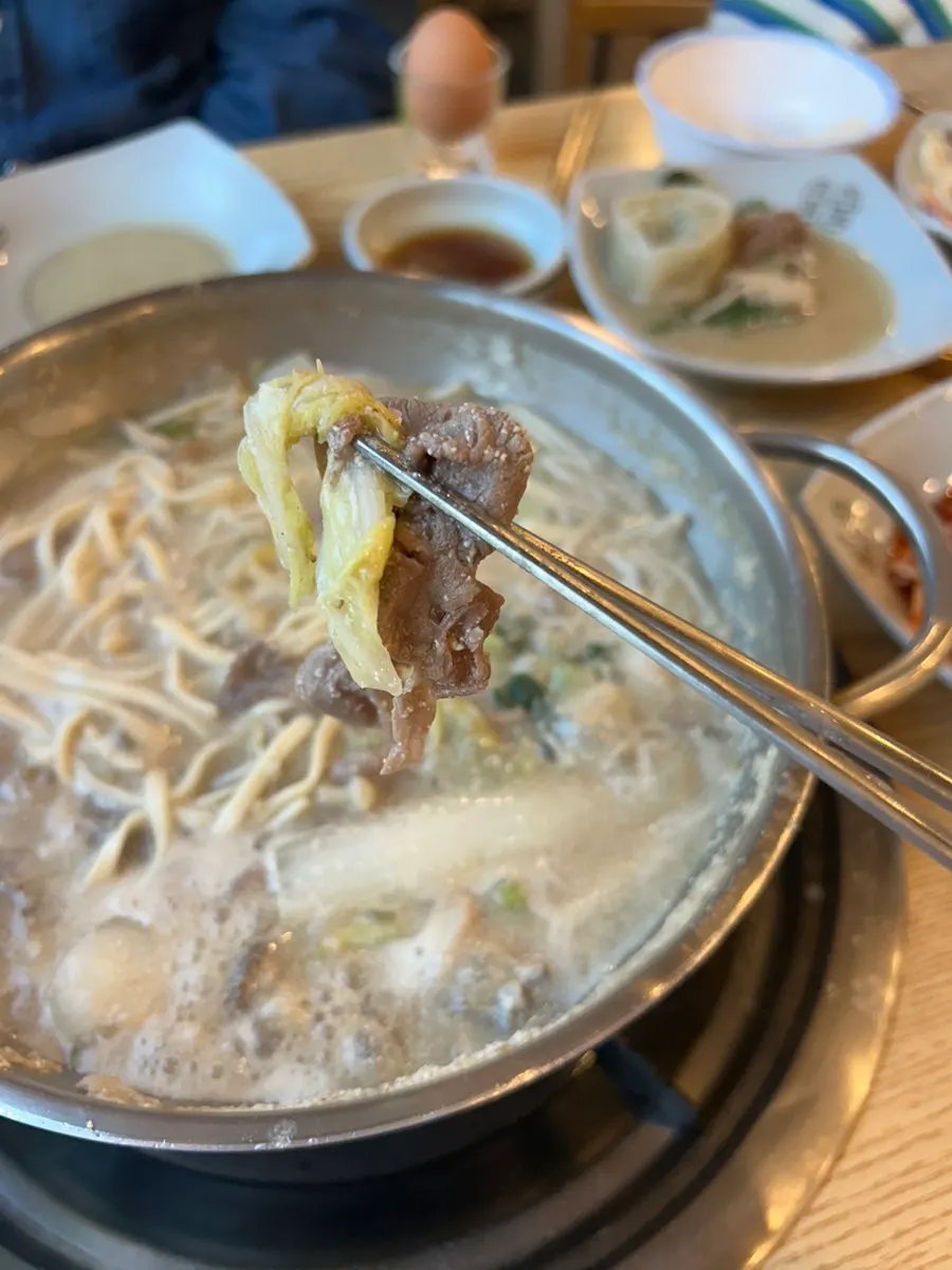 Shabu-shabu meat dipped into the secret soy sauce