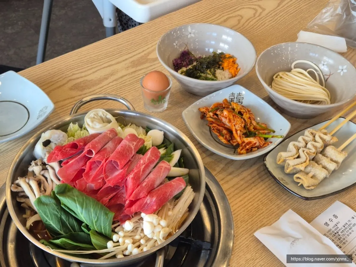 Table spread of the Italy 6-Ingredient Shabu Kalguksu spicy for two