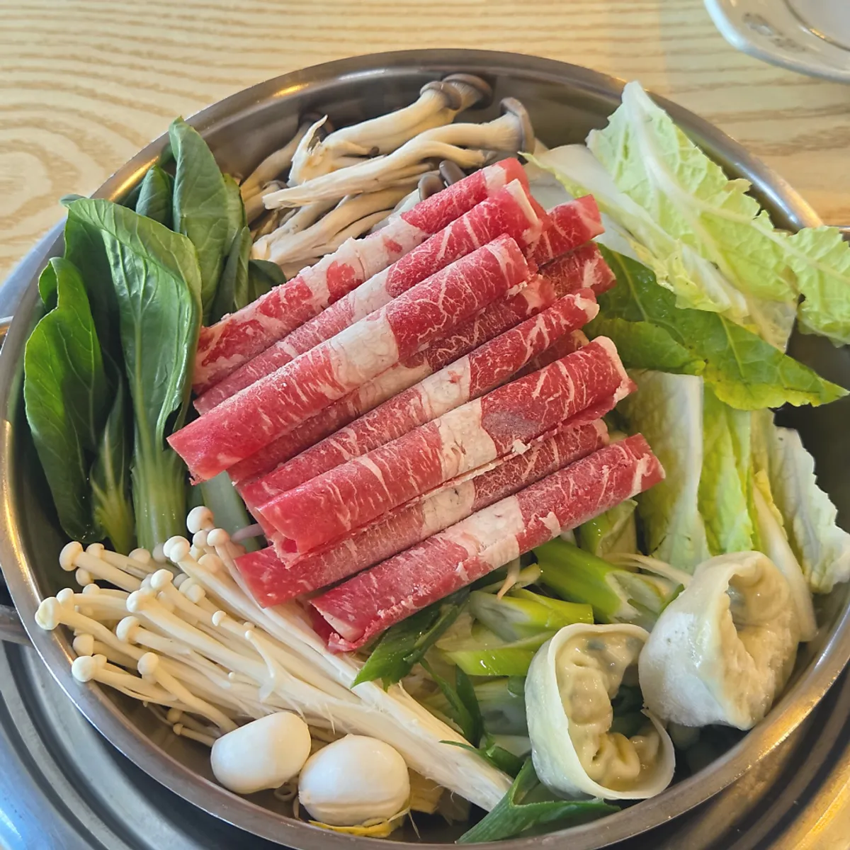 Full table setting of the 6-Ingredient Shabu Kalguksu for two