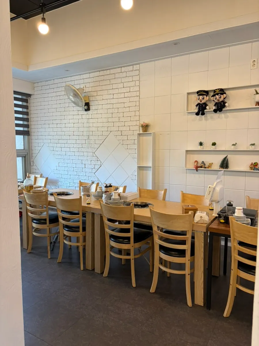 Clean restaurant interior with generously spaced tables