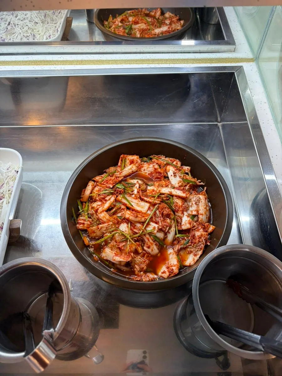 Self-serve bar corner with kimchi salad made fresh each morning