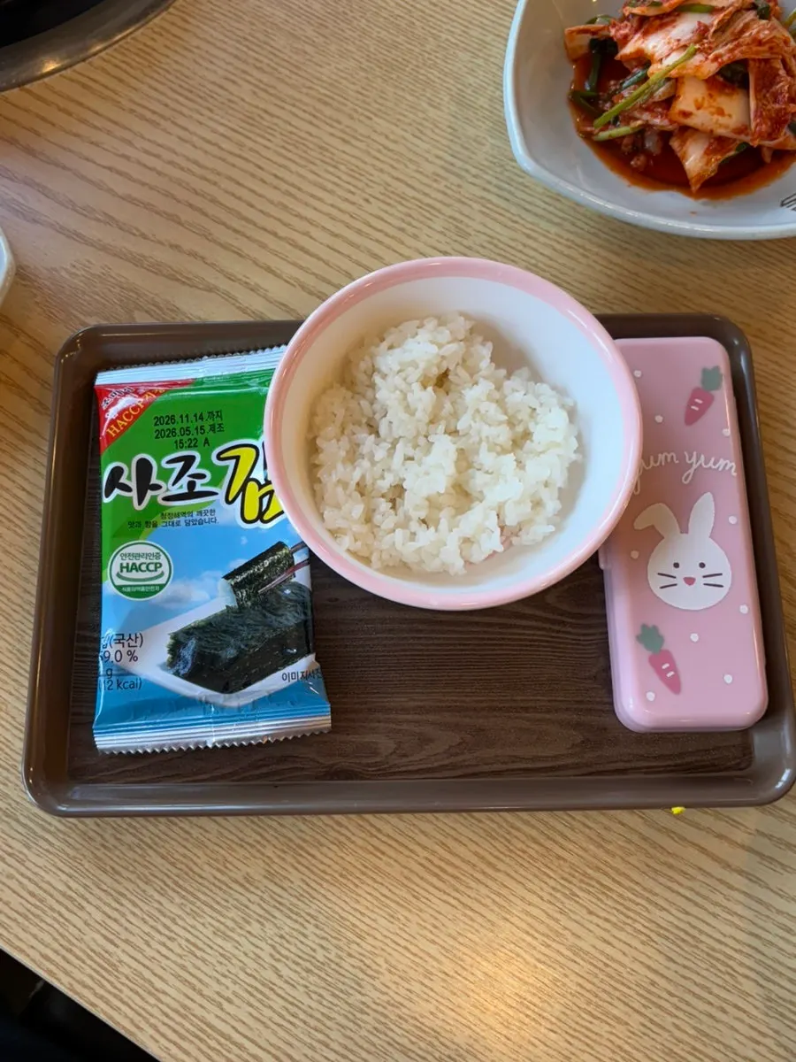 Complimentary rice and seaweed for the child