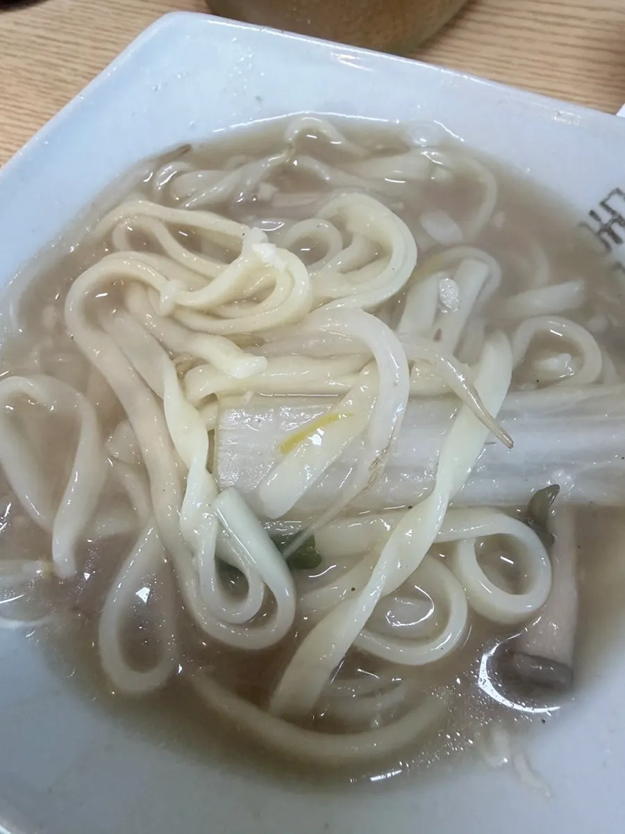 Self-made kalguksu noodles cooking in the broth