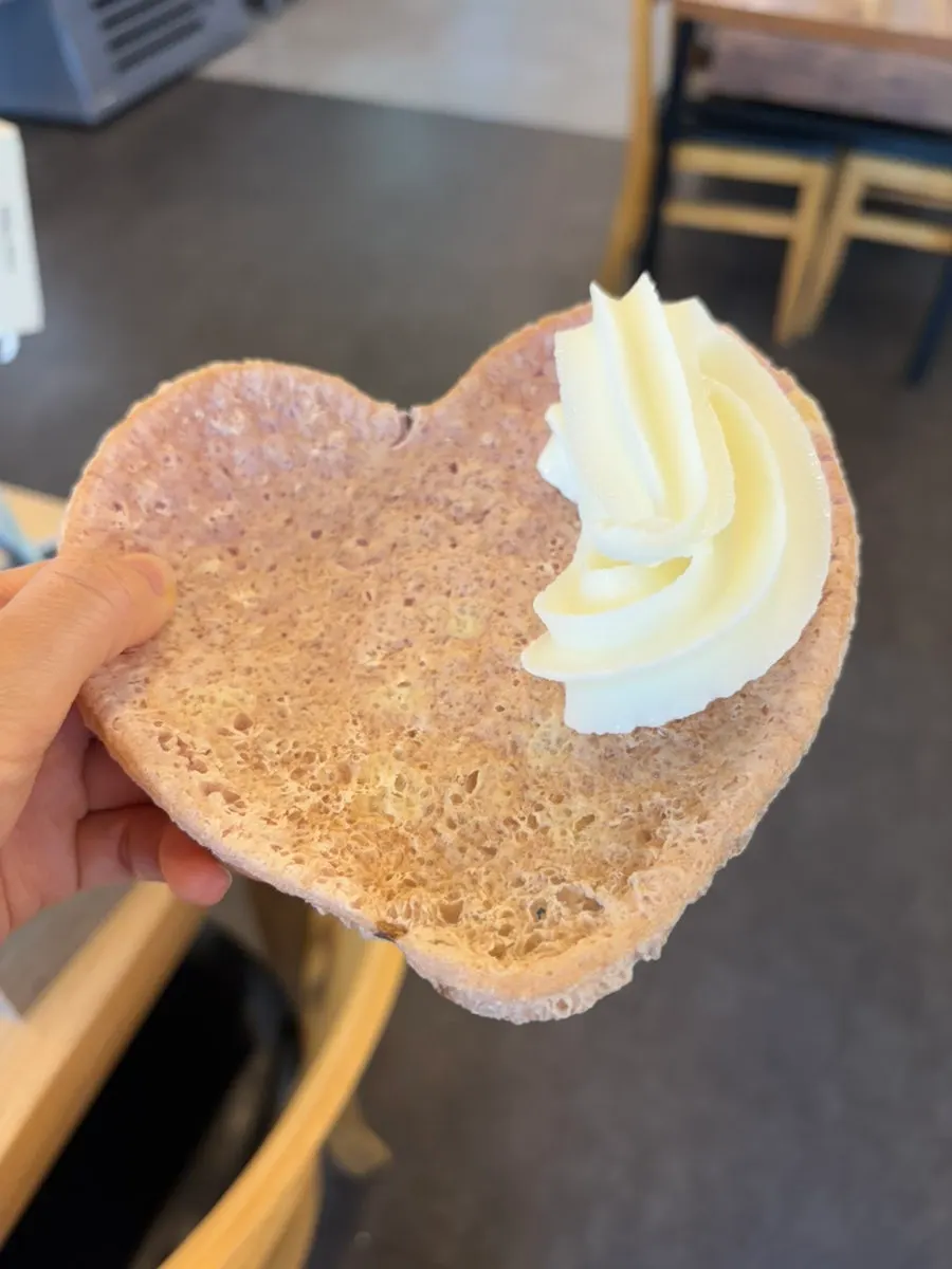 Soft serve piled generously onto a ppeongtwigi
