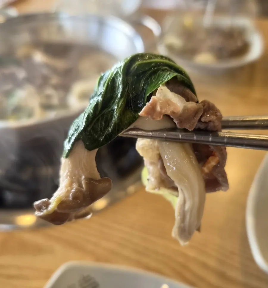 Vegetables and beef dipped in the secret soy sauce