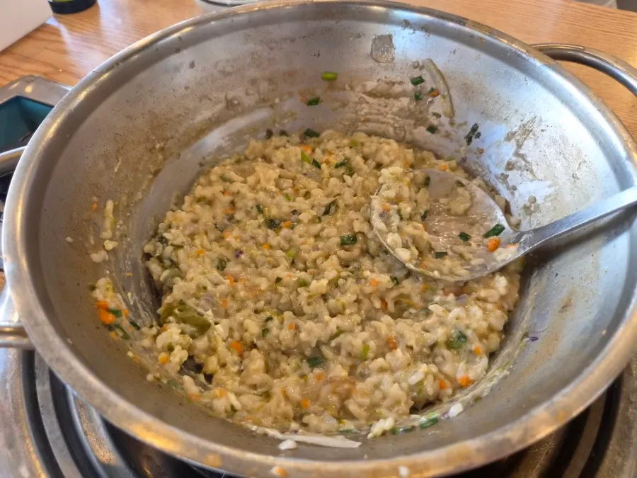 Vegetable porridge ingredients added to the remaining broth
