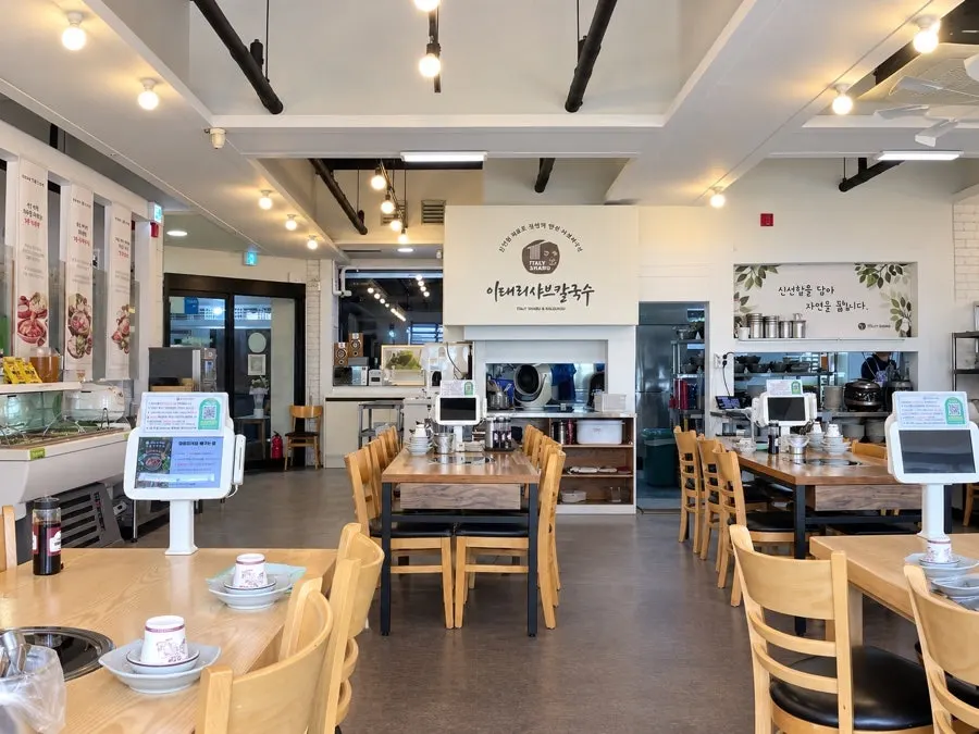 Restaurant seating with a view through the windows
