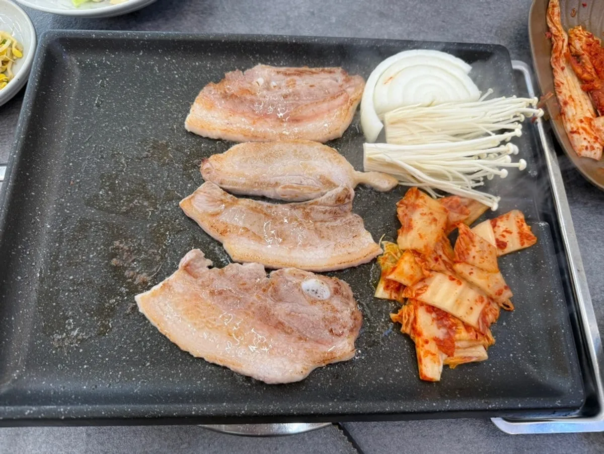 Fresh pork belly on the grill