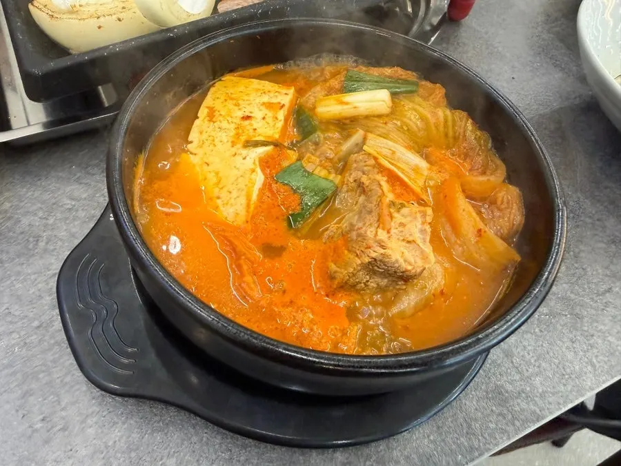Nurungji rice and galbi kimchi hot pot