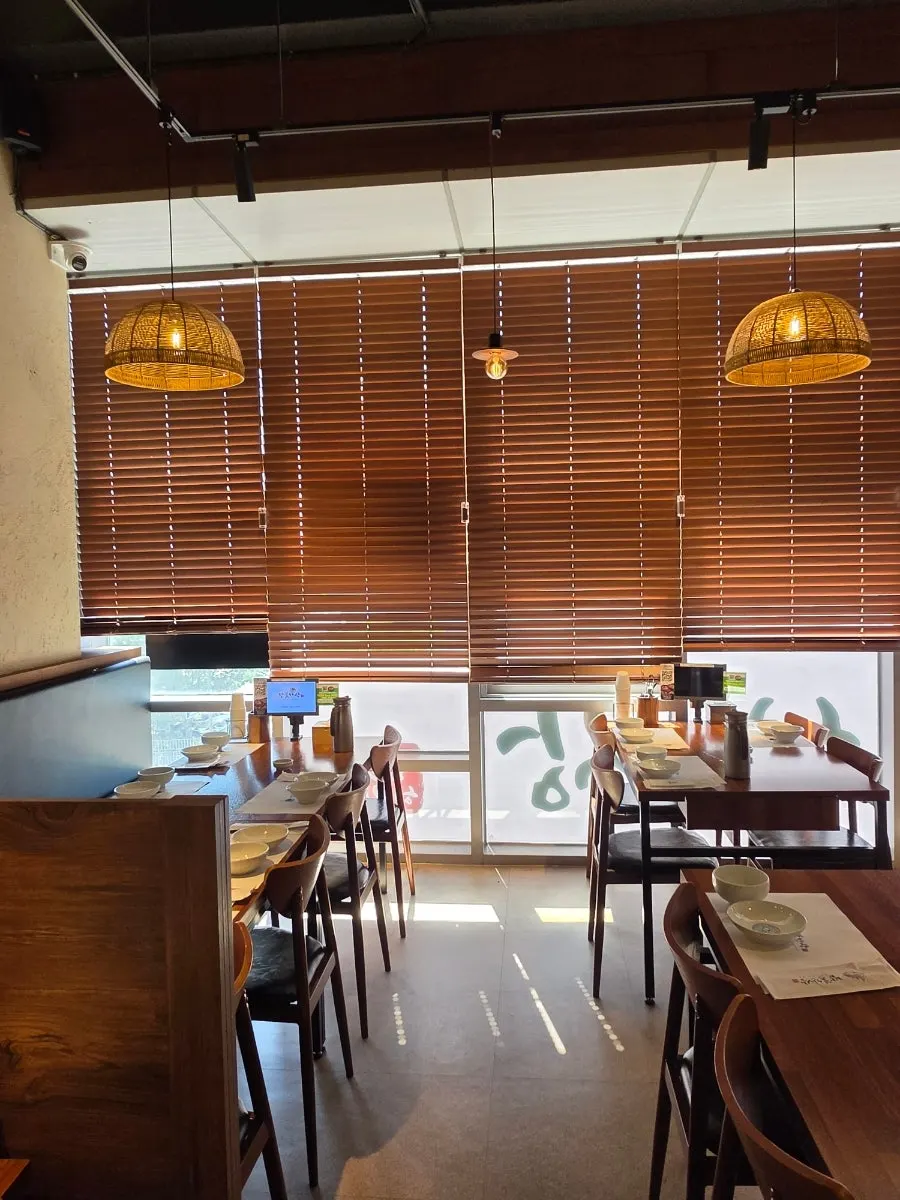 Korean restaurant interior with natural wood décor