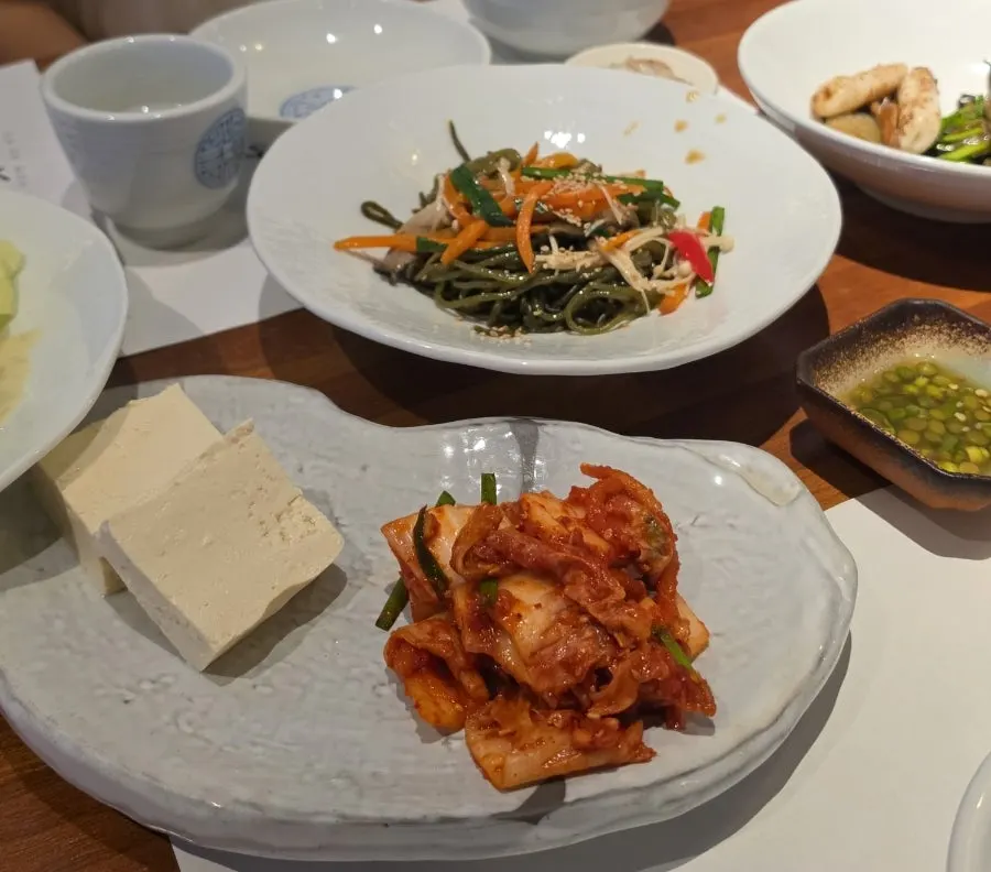 First spread with salad and boiled pork