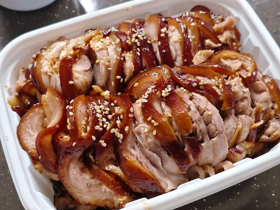 Side dishes and vegetables in takeout containers