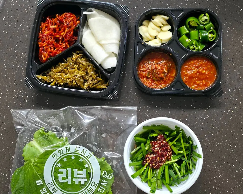 Takeout jokbal spread laid out at home