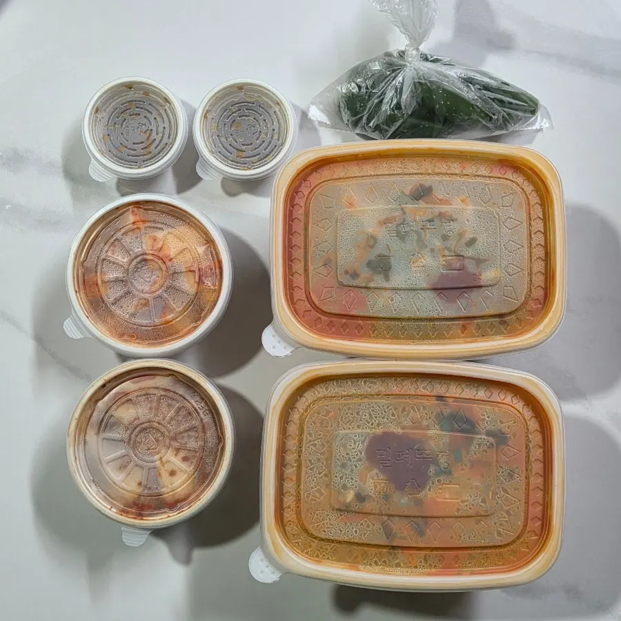 Extra ordered napa cabbage kimchi and kkakdugi packed for takeout