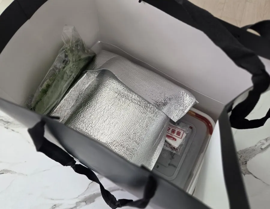 Cheongmigwan jokbal packed in a paper bag
