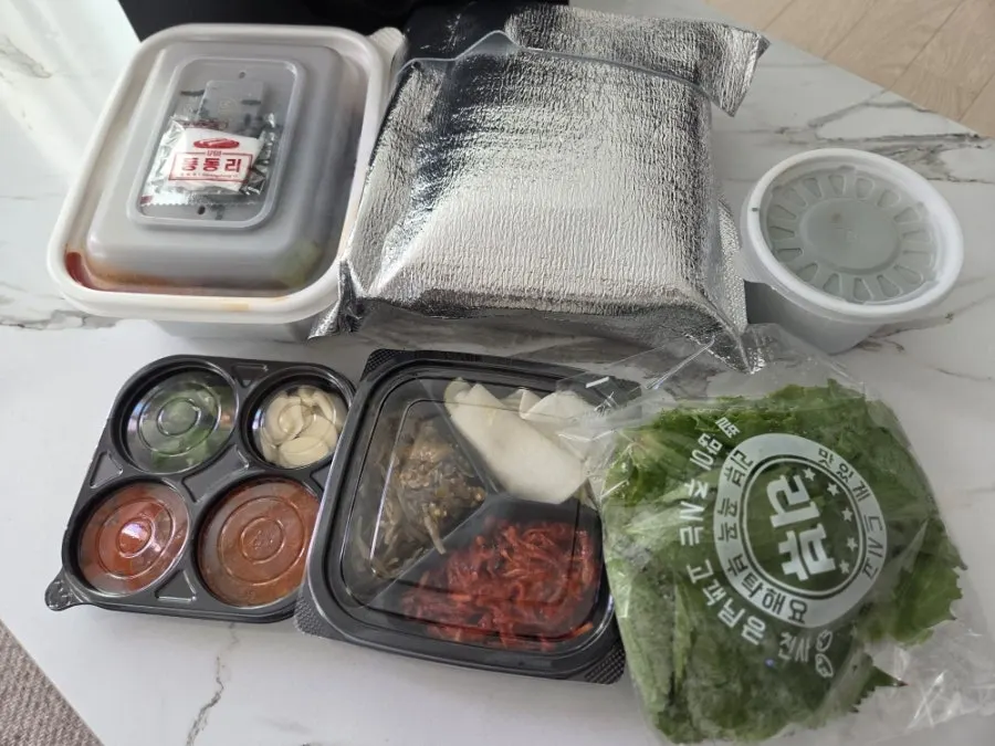 Takeout jokbal packed in a paper bag