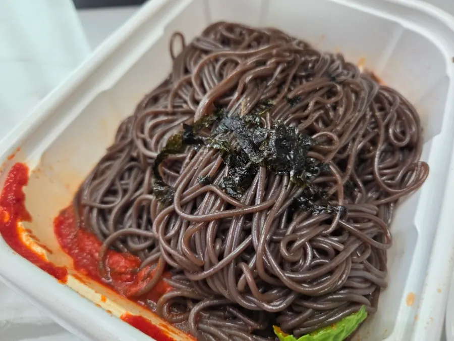 Takeout container of homemade fruit mak-guksu