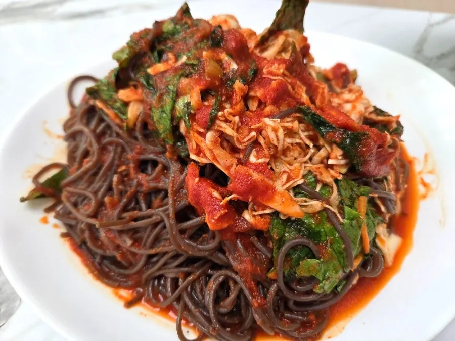 Jokbal enjoyed with shredded radish and other side dishes